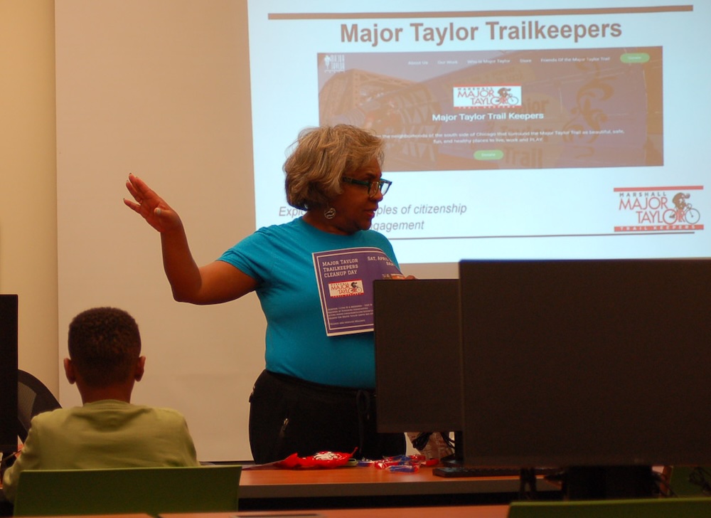 Simone Woods in Major Taylor t shirt at Kroc Center After School Program
